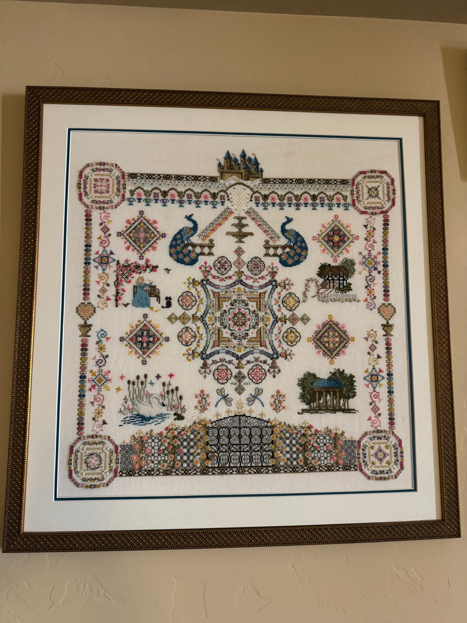 Garden sampler with peacocks and fountain